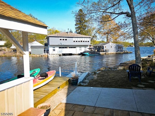 view of dock with a water view