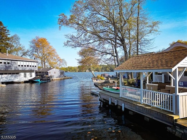 view of dock with a water view
