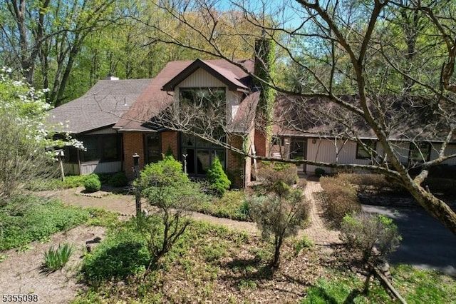 22 Pine Hill Rd, Delaware Twp, NJ 08559 - chalet / cabin with brick siding and a chimney