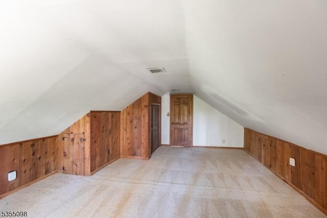 22 Pine Hill Rd, Delaware Twp, NJ 08559 - bonus room with wood walls, vaulted ceiling, and light colored carpet