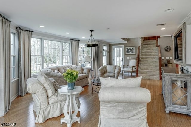 1251 Rahway Rd, Scotch Plains Twp, NJ 07076 - living area with crown molding, light wood-style flooring, and stairway