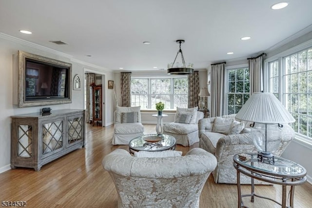 1251 Rahway Rd, Scotch Plains Twp, NJ 07076 - living area featuring visible vents, ornamental molding, a wealth of natural light, and light wood finished floors