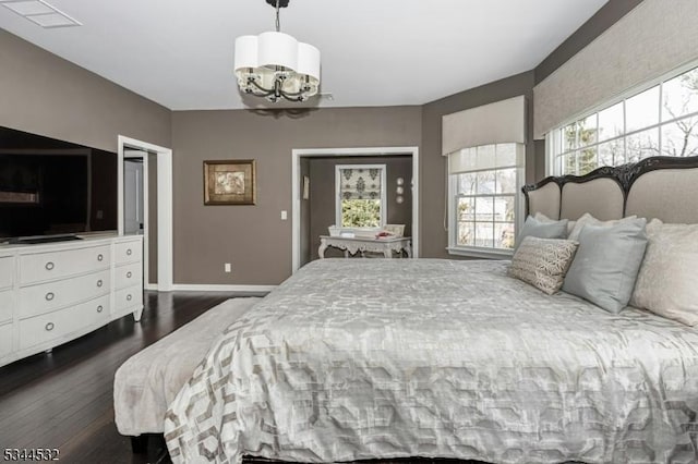 1251 Rahway Rd, Scotch Plains Twp, NJ 07076 - bedroom featuring baseboards, visible vents, dark wood finished floors, and a notable chandelier