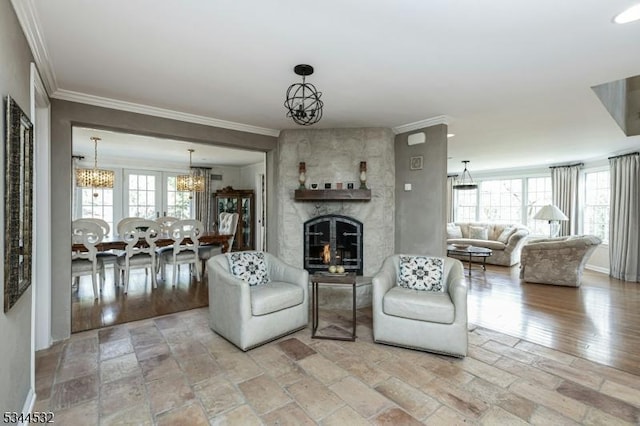 1251 Rahway Rd, Scotch Plains Twp, NJ 07076 - living area featuring an inviting chandelier, plenty of natural light, and ornamental molding