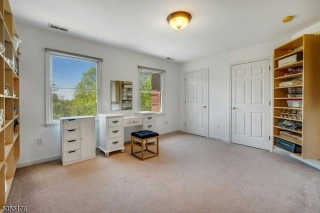 63 Twin Oaks Rd, Bridgewater Twp, NJ 08807 - interior space with light carpet, baseboards, and visible vents