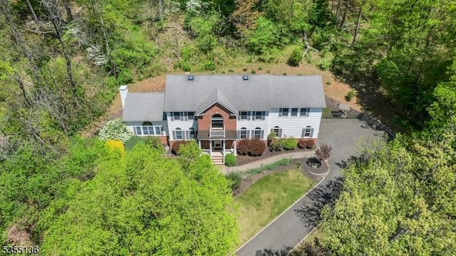 63 Twin Oaks Rd, Bridgewater Twp, NJ 08807 - drone / aerial view featuring a forest view