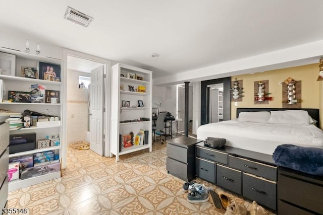 bedroom with visible vents