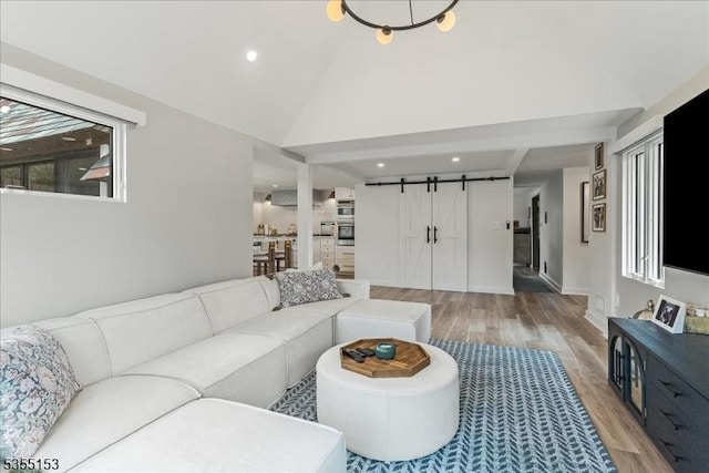 36 Island Trl, Sparta Twp, NJ 07871 - living area with high vaulted ceiling, light wood-style flooring, recessed lighting, and a barn door
