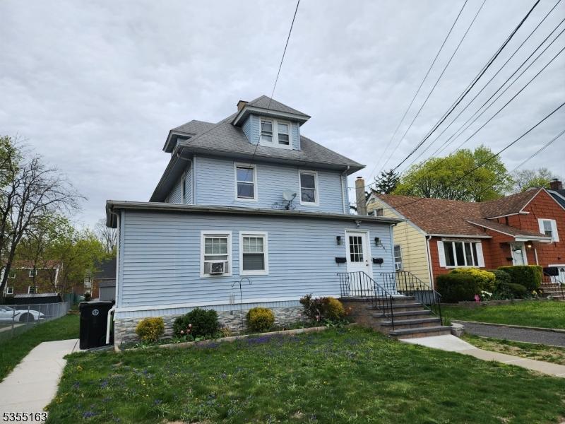 341 Sumner Ave, Plainfield City, NJ 07062 - view of front of home featuring a front lawn and cooling unit