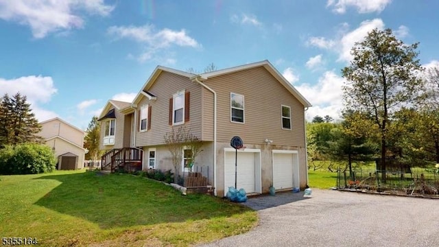 103 Race Track Cir, Montague Twp, NJ 07827 - view of side of home featuring a garage, asphalt driveway, and a yard