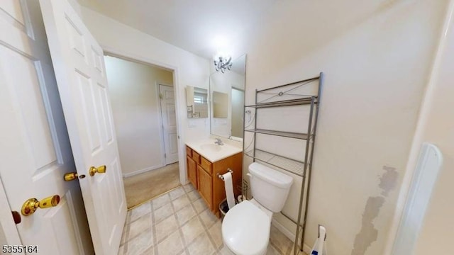 103 Race Track Cir, Montague Twp, NJ 07827 - bathroom with toilet, vanity, and baseboards