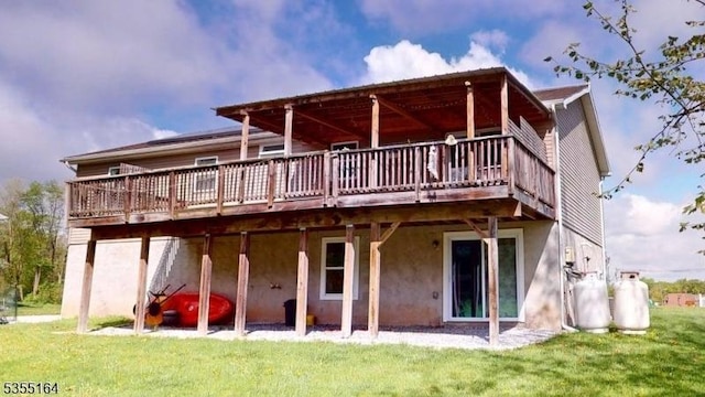 103 Race Track Cir, Montague Twp, NJ 07827 - rear view of house featuring a wooden deck, a yard, and stucco siding