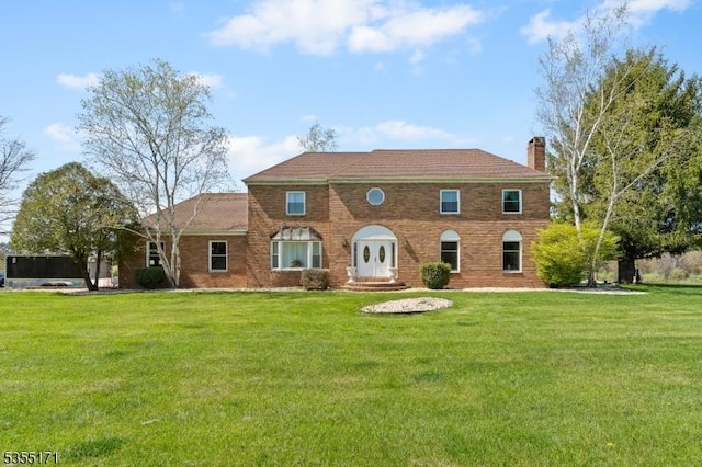 581 Montgomery Rd, Hillsborough Twp, NJ 08844 - view of front of property featuring a chimney and a front lawn