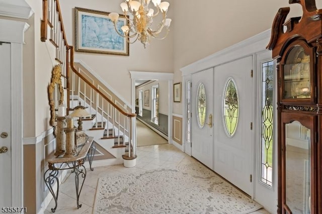 581 Montgomery Rd, Hillsborough Twp, NJ 08844 - foyer featuring plenty of natural light, a notable chandelier, stairs, and a towering ceiling