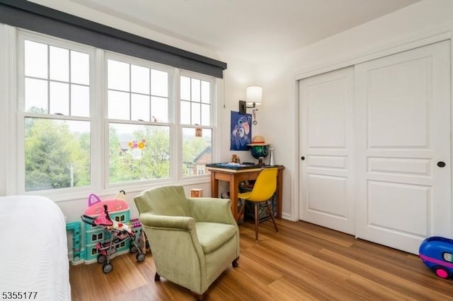 sitting room with wood finished floors