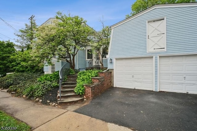 view of front of property with stairs