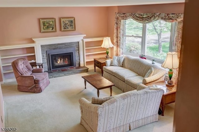living room featuring carpet floors and a fireplace