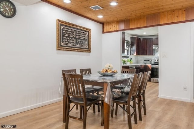 dining room featuring wood ceiling, light wood-type flooring, recessed lighting, and visible vents