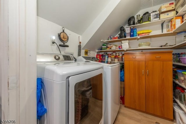 laundry room featuring laundry area and washing machine and dryer