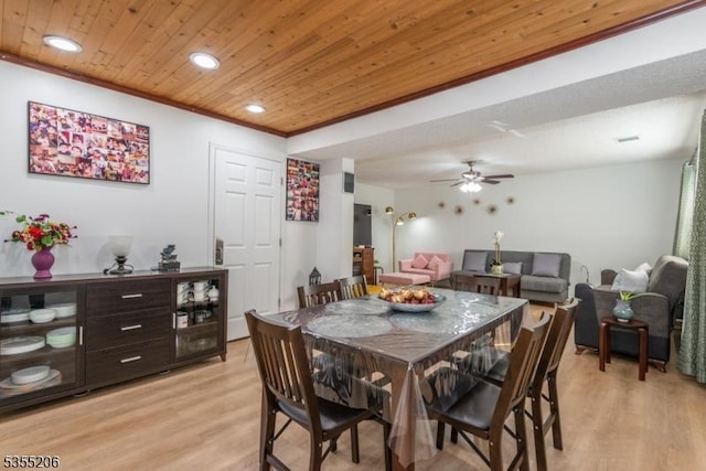dining space featuring ceiling fan, light wood-type flooring, wooden ceiling, ornamental molding, and recessed lighting