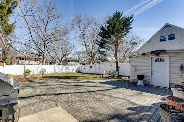 view of patio / terrace with a fenced backyard and grilling area