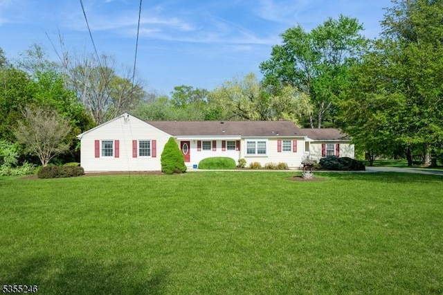ranch-style home with a front lawn