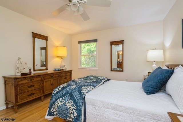 bedroom featuring a ceiling fan and light wood-style flooring