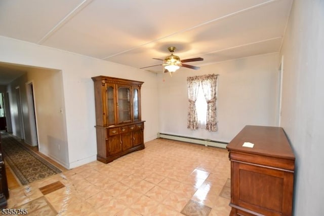 5634 Berkshire Valley Rd, Jefferson Twp, NJ 07438 - spare room with baseboards, a ceiling fan, and a baseboard heating unit
