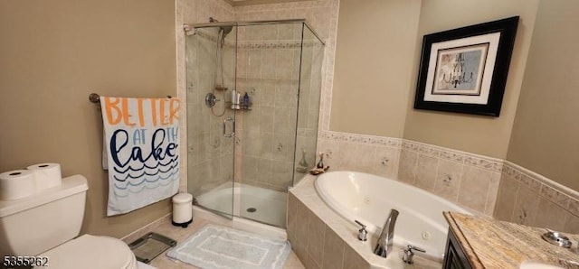 full bathroom with toilet, a tub with jets, a shower stall, and vanity