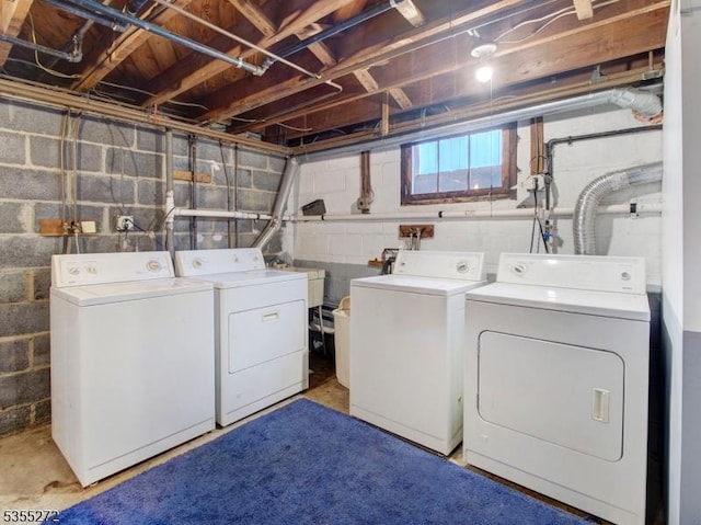 laundry room with independent washer and dryer and laundry area