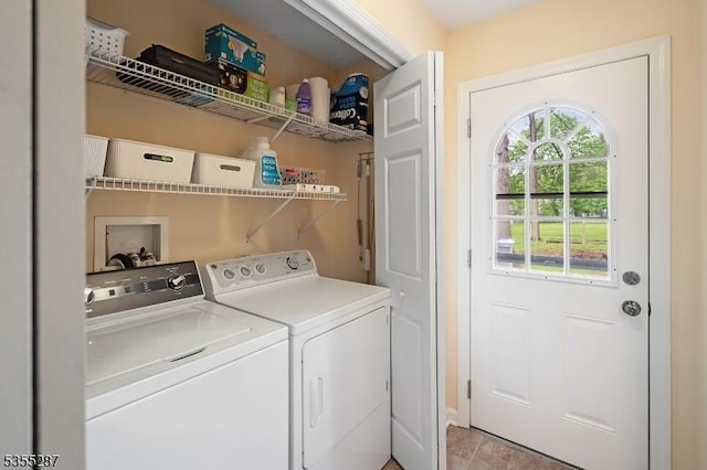 laundry area with washer and clothes dryer