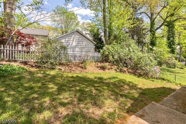 view of yard with fence