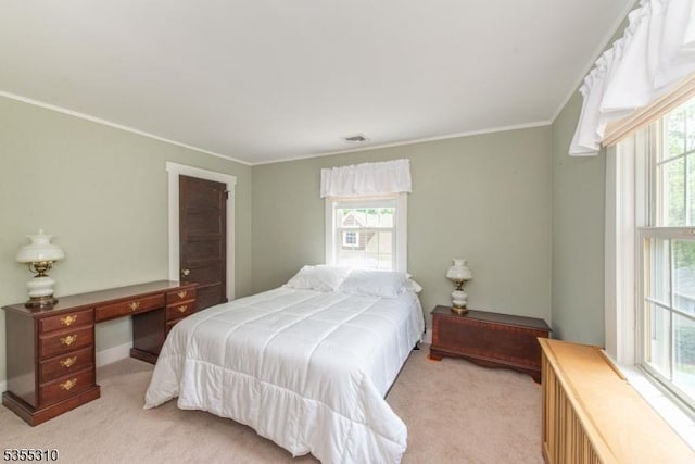 bedroom featuring light carpet, multiple windows, ornamental molding, and an office area