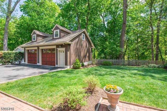 view of side of property featuring a garage