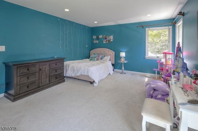 bedroom featuring light colored carpet, recessed lighting, and baseboards