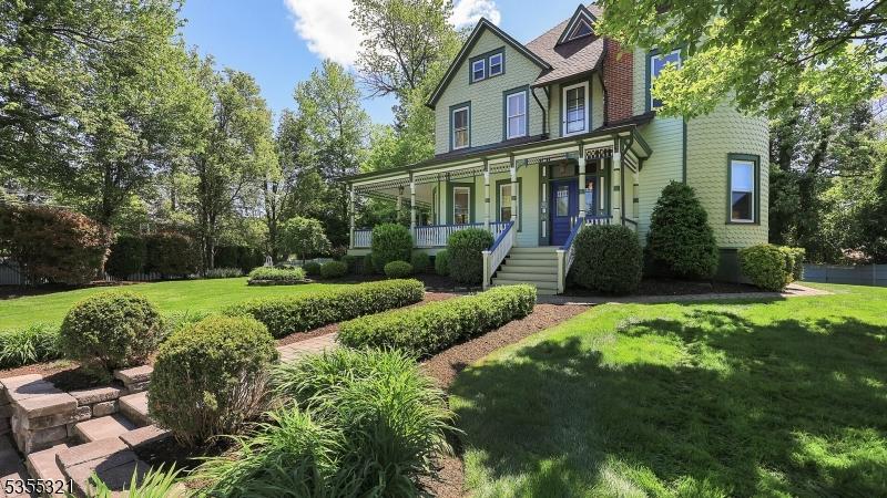 24 Madison Ave, Cranford Twp, NJ 07016 - victorian house featuring covered porch and a front lawn