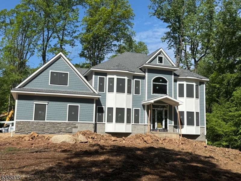 3 Upper Warren Way, Warren Twp, NJ 07059 - rear view of property with stone siding