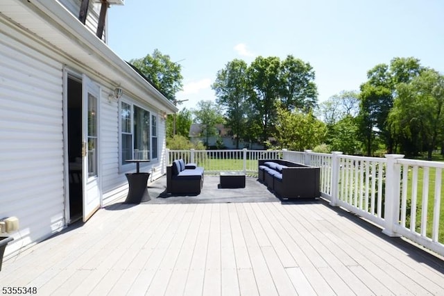 deck featuring an outdoor living space