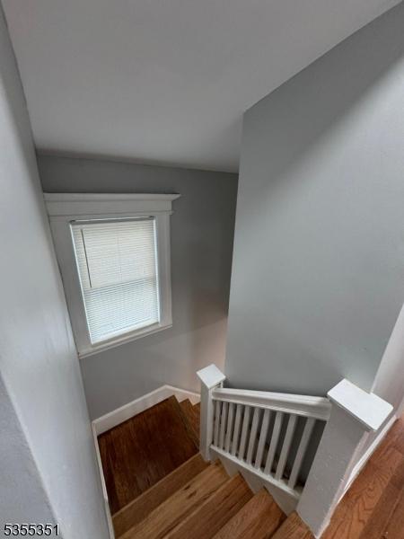 385 Stiles St, Union Twp, NJ 07088 - stairs featuring wood finished floors