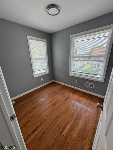 385 Stiles St, Union Twp, NJ 07088 - empty room featuring wood finished floors and baseboards