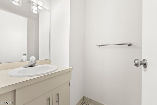 bathroom featuring tile patterned floors and vanity
