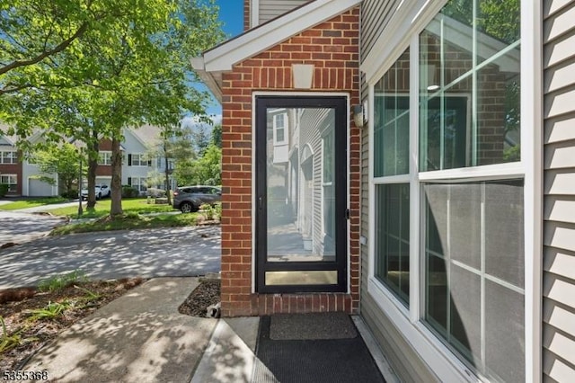 4703 Patterson St, Bridgewater Twp, NJ 08807 - view of exterior entry featuring brick siding