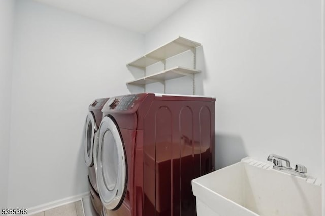4703 Patterson St, Bridgewater Twp, NJ 08807 - washroom with washer and dryer, baseboards, and tile patterned flooring
