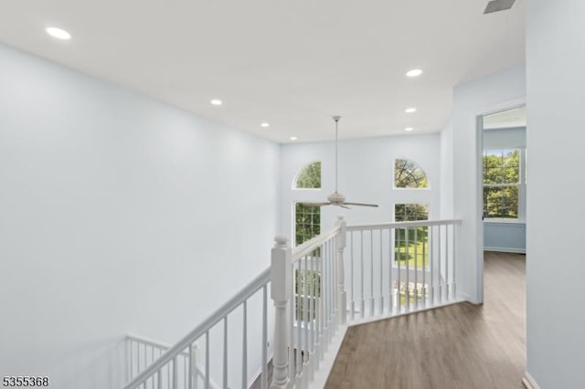 4703 Patterson St, Bridgewater Twp, NJ 08807 - corridor with wood finished floors, recessed lighting, an upstairs landing, and baseboards