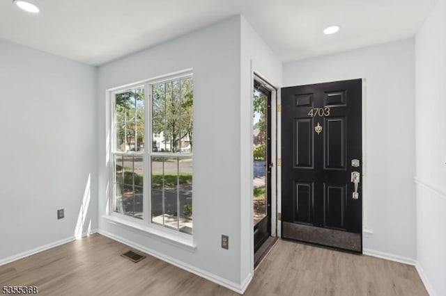 4703 Patterson St, Bridgewater Twp, NJ 08807 - entryway with wood finished floors, recessed lighting, and baseboards