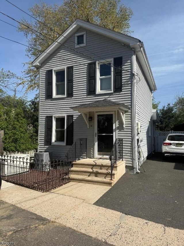 11 Union St, Franklin Twp, NJ 08528 - view of front of property with central AC unit and fence