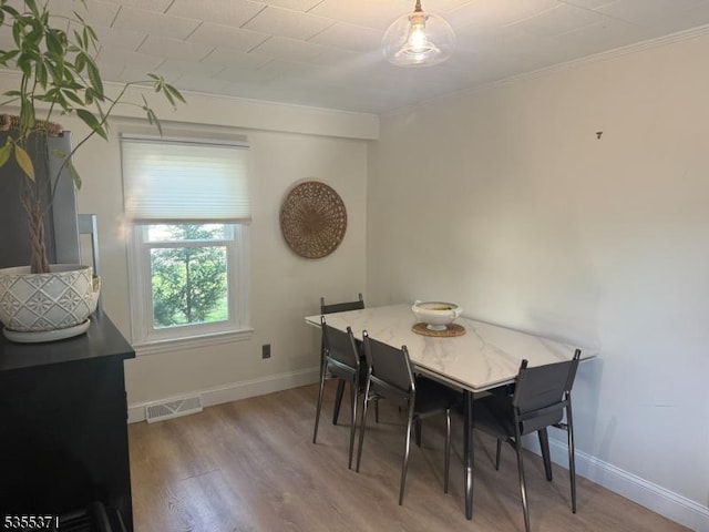 11 Union St, Franklin Twp, NJ 08528 - dining space featuring wood finished floors, baseboards, and crown molding