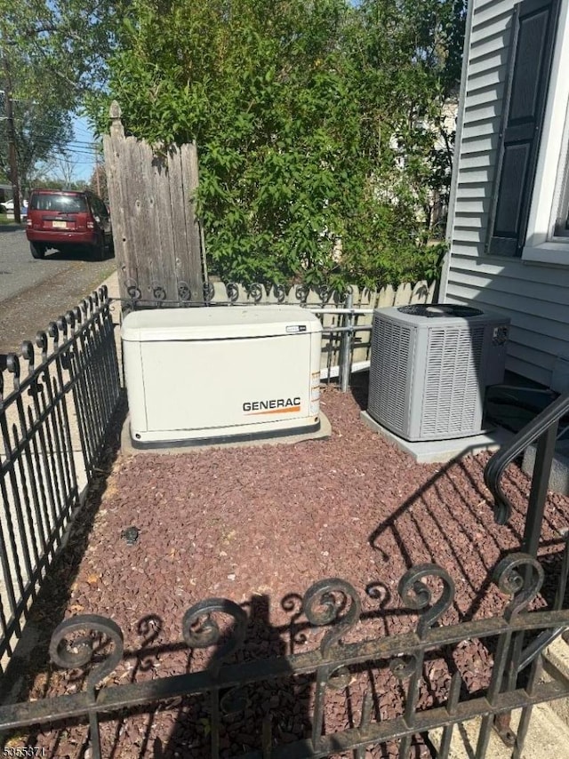 11 Union St, Franklin Twp, NJ 08528 - view of patio / terrace featuring central AC and fence