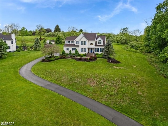 view of front of home with a front yard