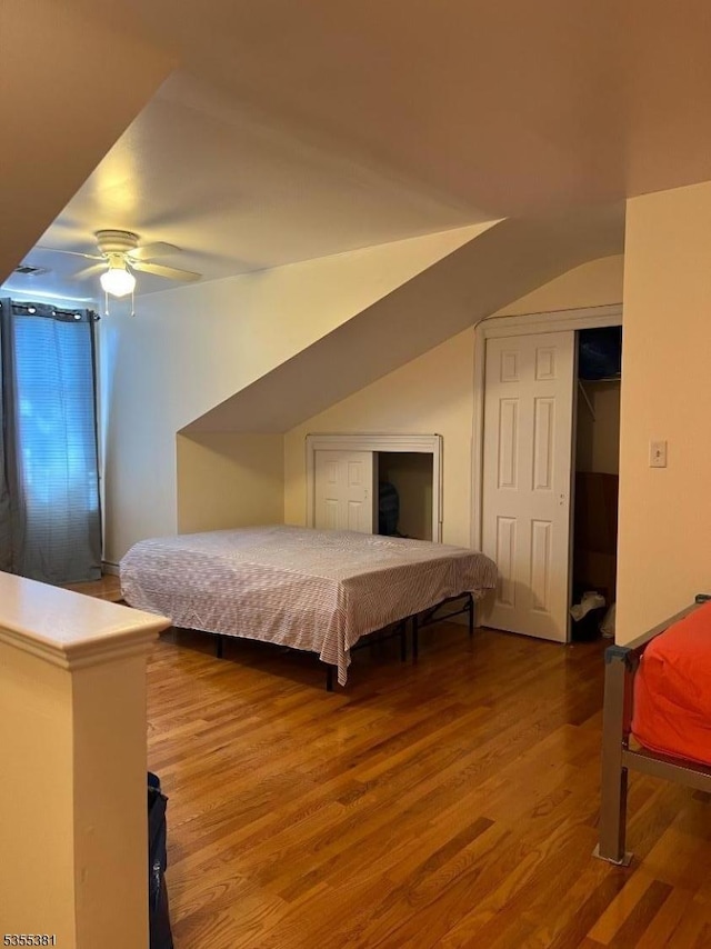 3 Harbor Front Ct Unit 3, Elizabeth City, NJ 07206 - bedroom featuring wood finished floors, a ceiling fan, and multiple closets